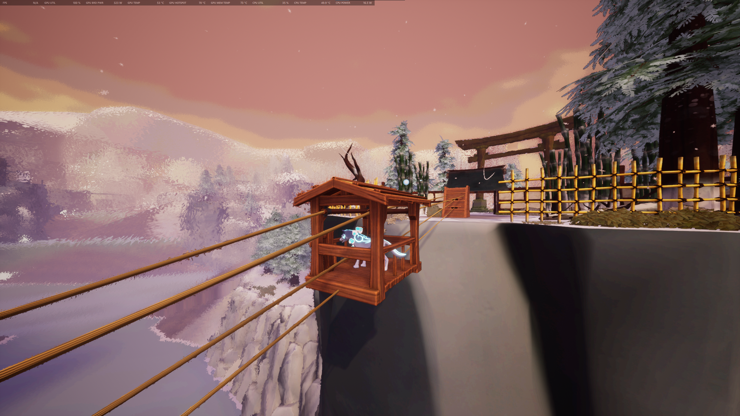 Kazeyo patiently stands inside a wooden carriage, traveling along a line of ropes over a valley.